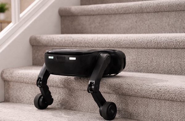Black legged robot vacuum climbs carpeted household stairs demonstrating stair climbing cleaning ability in a modern softly lit home interior